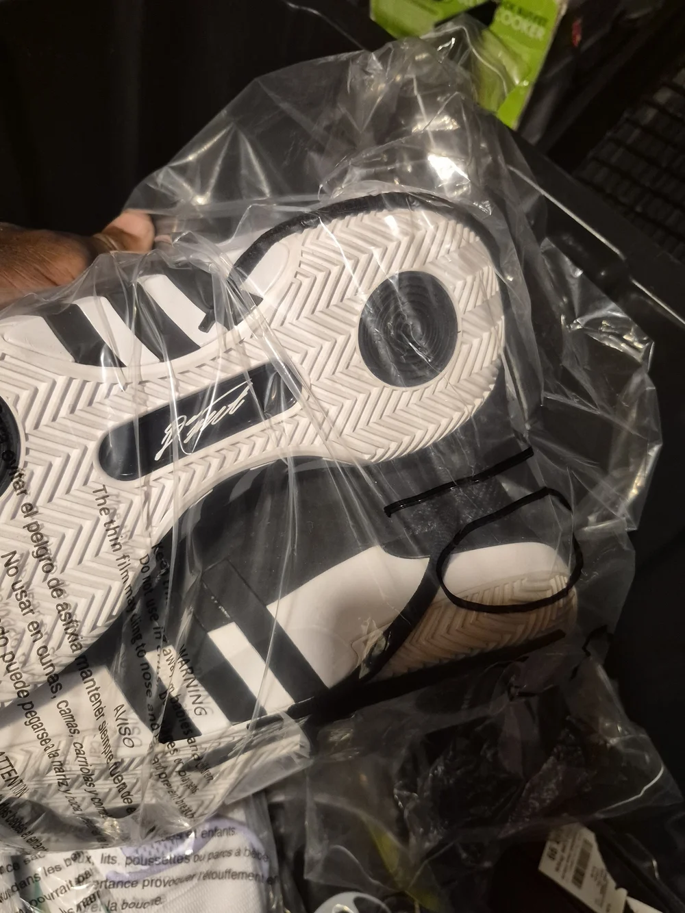 adidas Men’s Black and White Sneakers